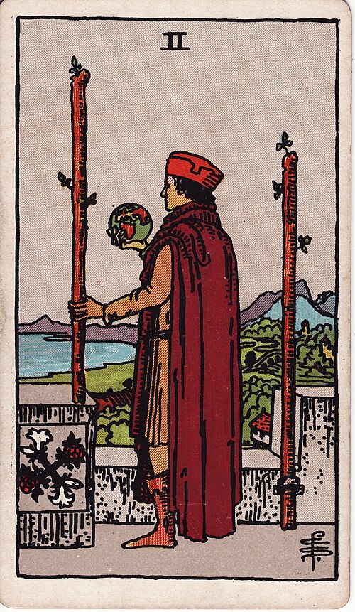 Two Of Wands Tarot Card: Upright, Reversed & Spread Meanings — Rider-Waite-Smith tarot card